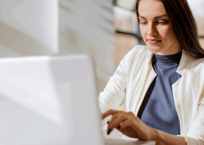 women looking at her email on the computer