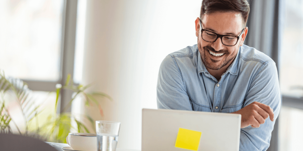 Male business owner looking at the computer
